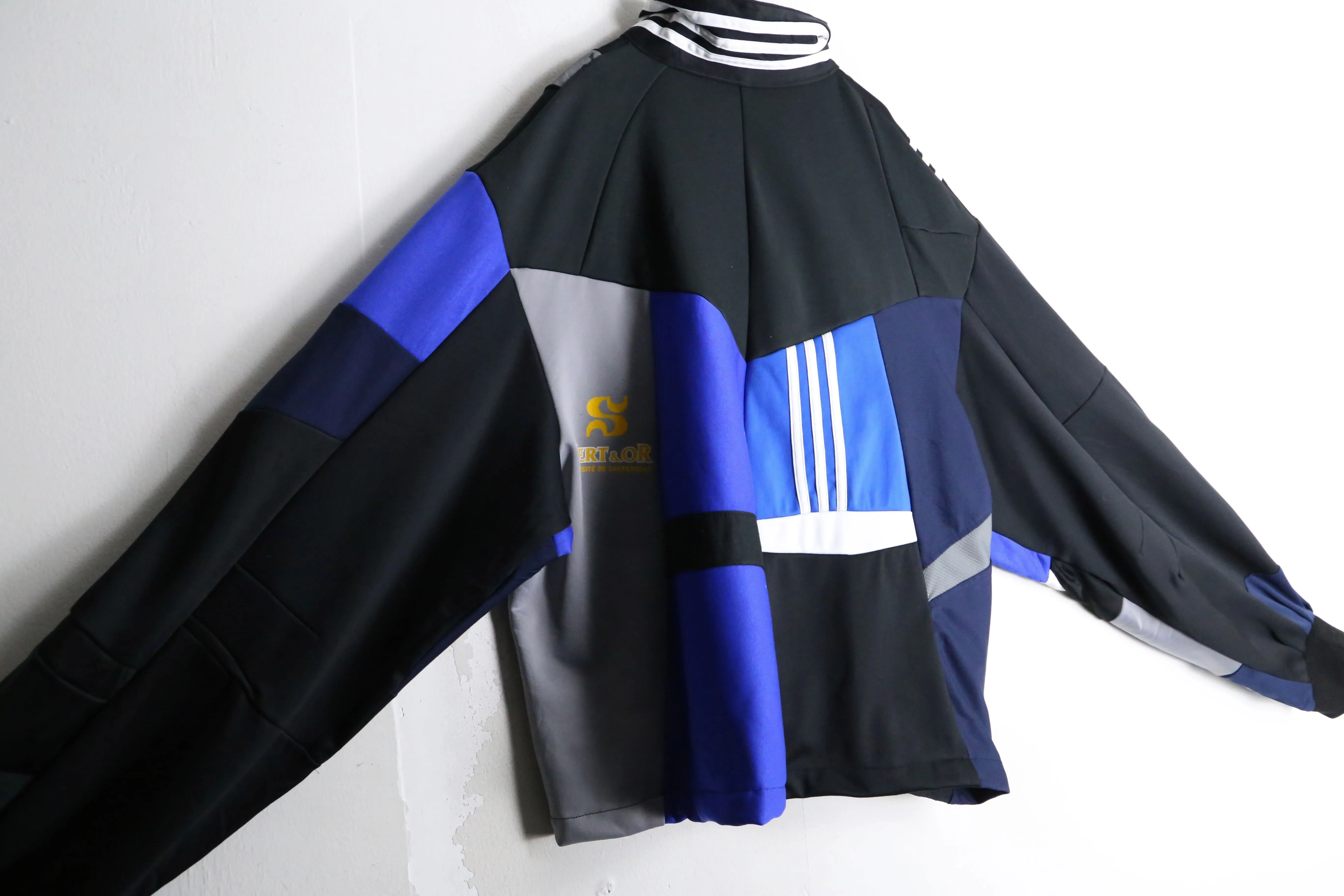 "Re:make" black×blue patchwork track jacket