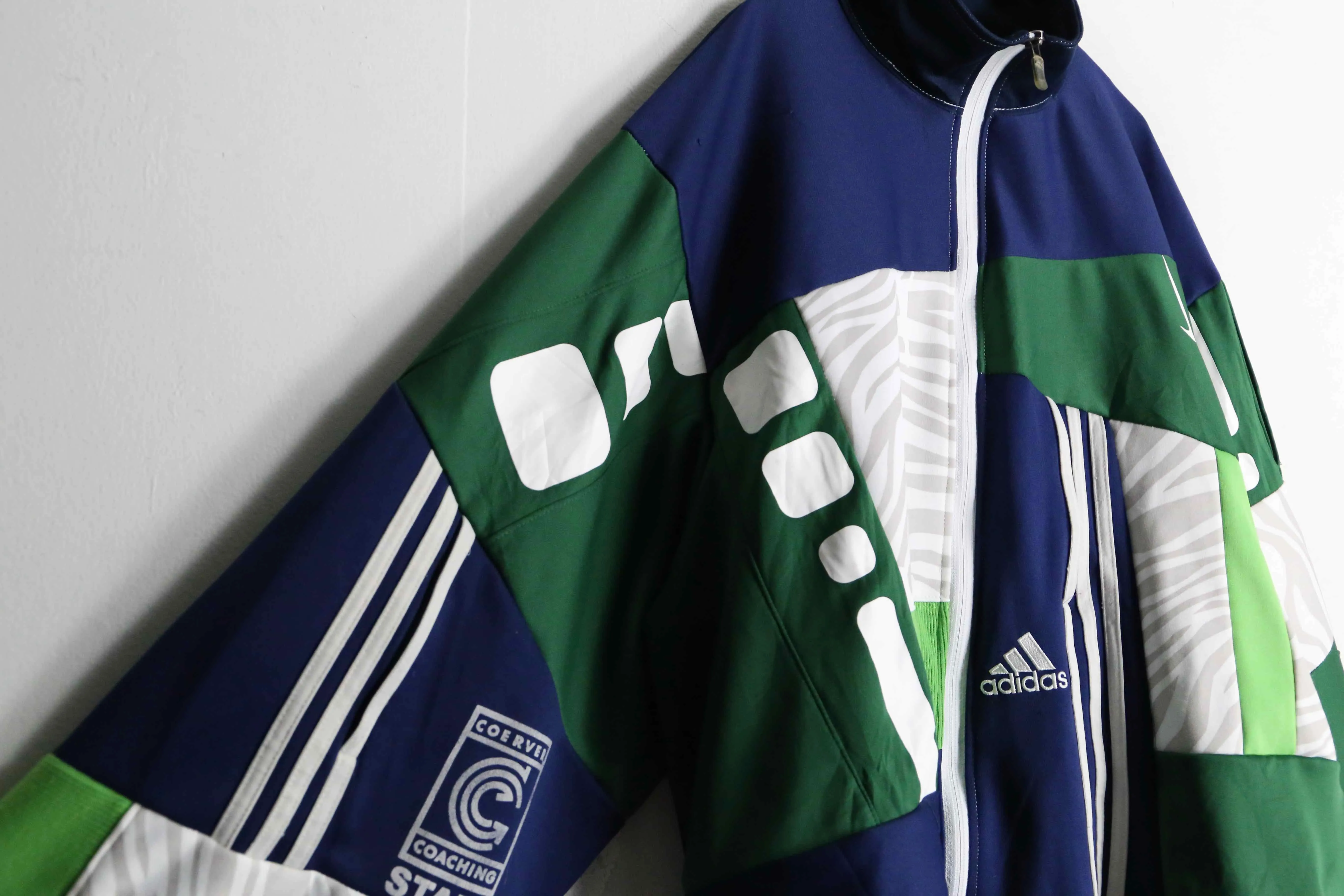 "Re:make"green × navy color random track jacket